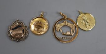 A yellow metal openwork pendant with bridge and gondola scene, an 'Acropolis' pendant (both