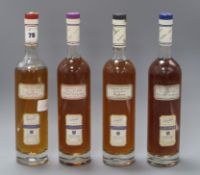 Four bottles of assorted Louis Royer Cognac, including Grande and Petite Champagne