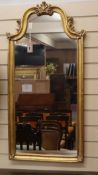 A reproduction gilt framed wall mirror H.102cm