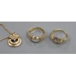 Two 9ct gold gem-set rings and a 9ct gold openwork pendant set four small diamonds on 9ct gold