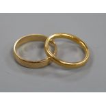 A 22ct gold wedding band (4.2g) and an 18ct gold wedding band (3.6g).