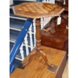 A Victorian octagonal walnut games table W.47cm