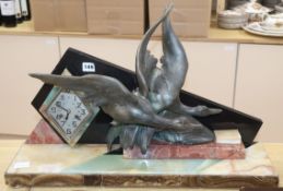 An Art Deco spelter and marble 'ducks' mantel clock