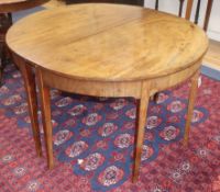 A George III mahogany D-end two-section dining table (one additional leaf) 114cm