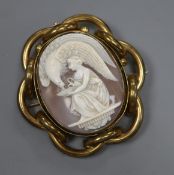 A Victorian pinchbeck mounted oval cameo brooch, carved with Ganymede feeding the eagle, 7cm.