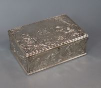 A 20th century white metal rectangular box, decorated with figures at various pursuits, 17.1cm.