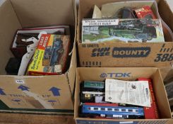 A quantity of Hornby Tri-Ang and other '00' gauge wagons and track, early Scalextric, games, etc.