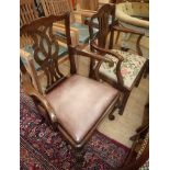 Two George III mahogany elbow chairs