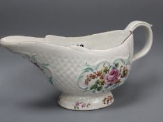 An early Derby polychrome sauceboat, c.1758, patch marks,