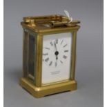 A Eustance & Co brass carriage timepiece with key