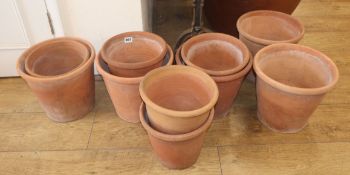 A set of ten vintage terracotta pots in two sizes by Ward, Staffordshire largest 25cm high