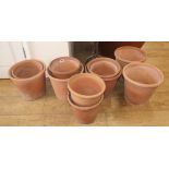 A set of ten vintage terracotta pots in two sizes by Ward, Staffordshire largest 25cm high