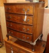 A small reproduction bowfront walnut chest W.62cm