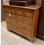 A George III fruitwood chest of drawers with brushing slide W.89cm