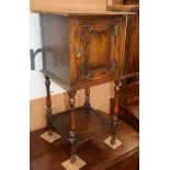 A small 1920's oak bedside cabinet