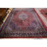 A Tabriz carpet 380 x 254cm