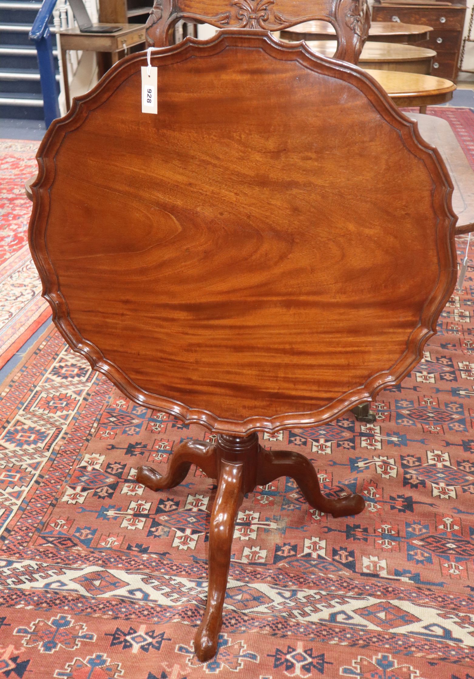 A Chippendale style mahogany piecrust tilt top circular tripod table Diameter 86cm