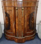 A small Victorian ormolu mounted walnut and marquetry serpentine fronted side cabinet 104cm