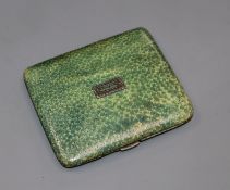 A George V silver and shagreen cigarette case with marcasite set applique, Birmingham, 1925, 88mm.