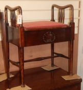 An Edwardian mahogany box seat piano stool