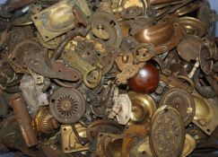 A large collection of assorted furniture handles, plates etc