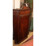 A George III inlaid mahogany hanging corner cabinet H.138cm