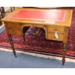 A late Victorian mahogany writing table, fitted four drawers W.91cm