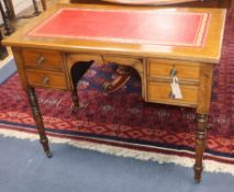 A late Victorian mahogany writing table, fitted four drawers W.91cm