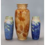 A Royal Doulton leaf pattern vase and another pair of Royal Doulton vases (3)