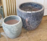 Two small garden planters Larger 34cm