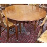 A George III mahogany oval drop-leaf pad foot dining table 124cm extended