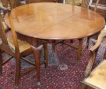 A George III mahogany oval drop-leaf pad foot dining table 124cm extended