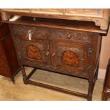 A small 17th century style inlaid oak cupboard W.98cm