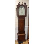 An early 19th century mahogany 8 day striking longcase clock, the arched enamelled dial painted with