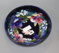 A Moorcroft orchid pottery bowl diameter 27cm