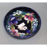 A Moorcroft orchid pottery bowl diameter 27cm