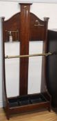 An Arts & Crafts oak and brass stick and coat stand (Shoolbred?) H.124cm