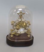 A Victorian small brass skeleton clock under glass dome overall height 23cm