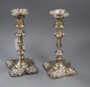 A pair of Victorian rococo style silver candlesticks, Henry Wilkinson & Co, Sheffield 1843/4, 22.