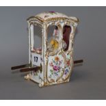 A German porcelain model of a sedan chair, early 20th century, height 13cm