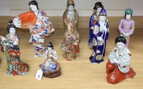 Nine Japanese porcelain / pottery figures tallest 37cm