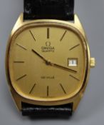 A gentleman's 1970's steel and gold plated Omega De Ville quartz wrist watch, on associated