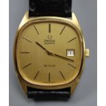 A gentleman's 1970's steel and gold plated Omega De Ville quartz wrist watch, on associated