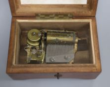 A Swiss walnut cased musical box, playing two airs