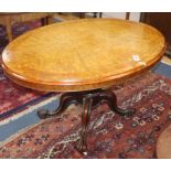 A Victorian walnut oval breakfast table L.120cm