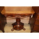 An early Victorian rosewood folding card table W.92cm