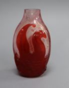 A Chinese overlaid glass 'fish' snuff bottle, 19th century