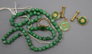 A group of Chinese jadeite jewellery, including a necklace, ring stamped 15, yellow metal pendant