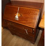 An Edwardian inlaid mahogany bureau