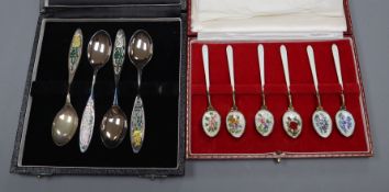 A set of six silver gilt and floral enamelled coffee spoons, a set of 4 (of 6) silver and